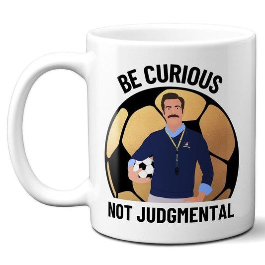 Be Curious Not Judgmental (American English Spelling) with gold football - Coffee Mug